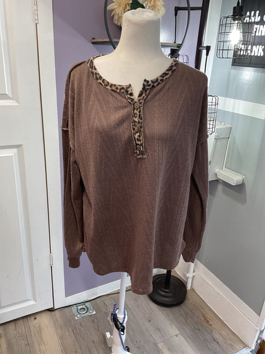 Cable knit button front with accent