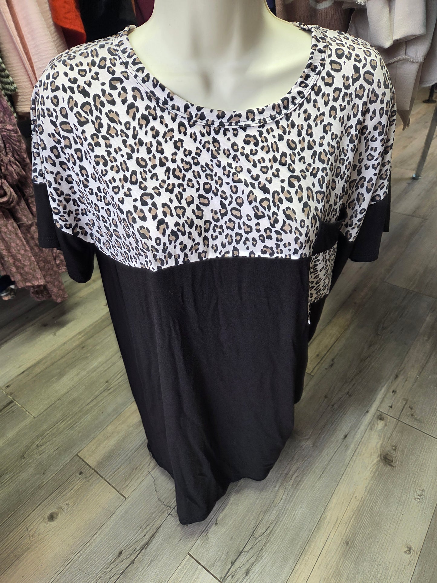 Solid print with animal accent top