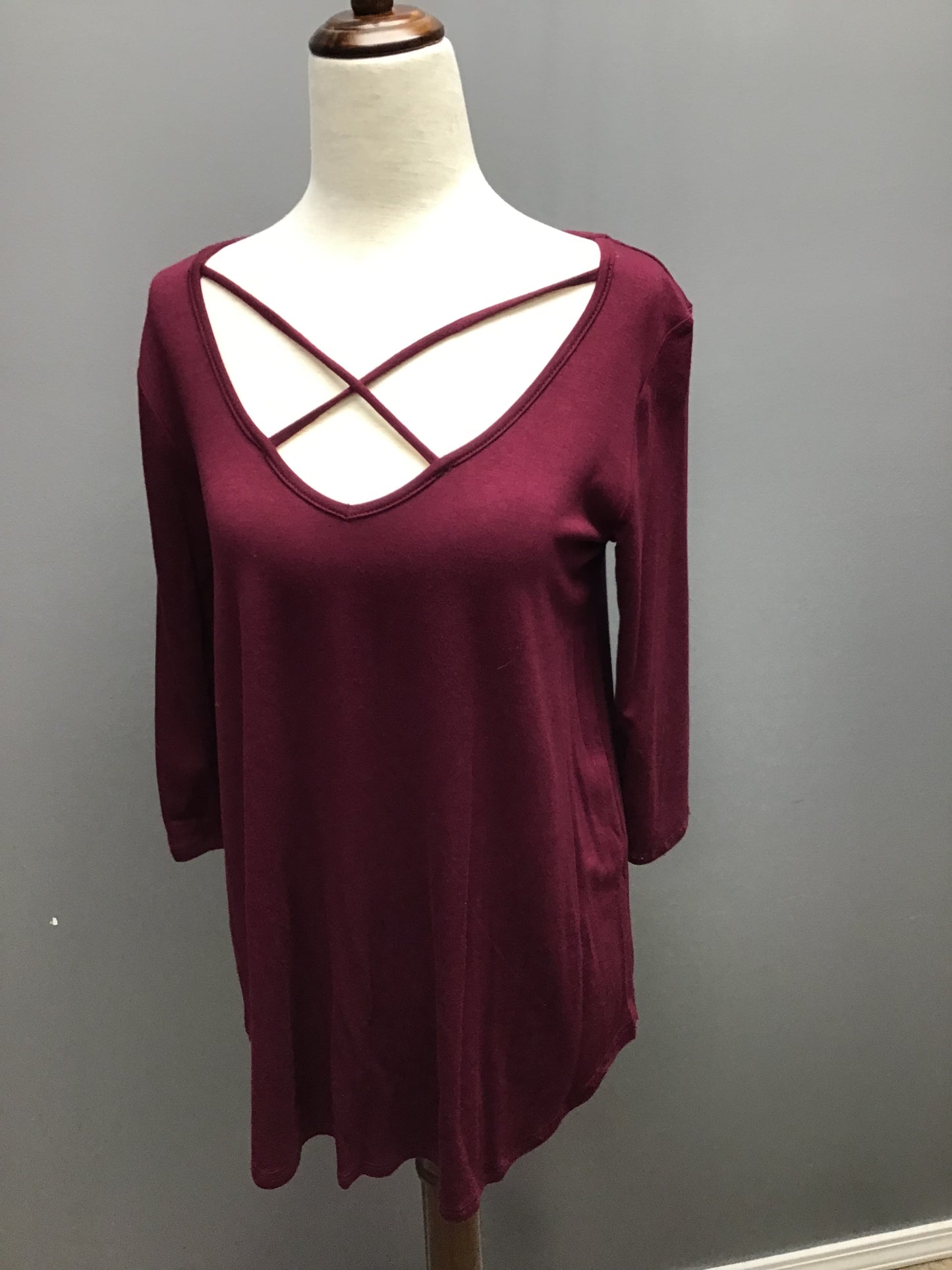 Solid criss cross neckline